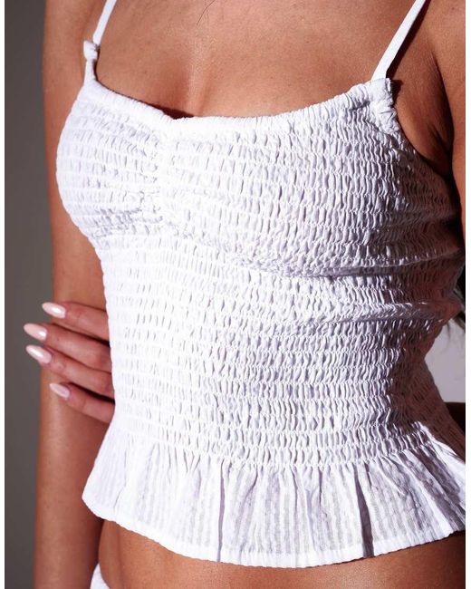 South Beach White Seersucker Smocked Peplum Top