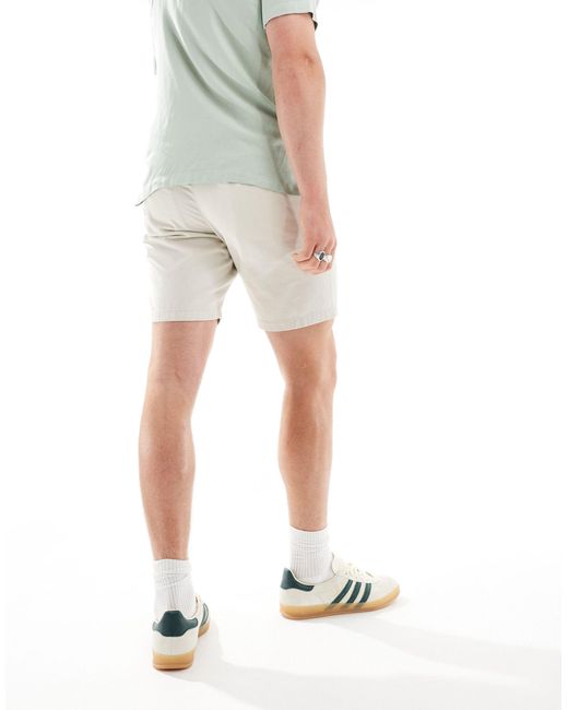 Confezione da 2 pantaloncini chino elasticizzati slim kaki e color pietra di ASOS in Green da Uomo
