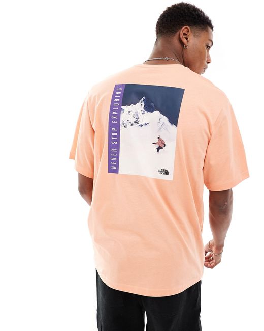 The North Face Orange Snowboard Retro Back Graphic T-shirt for men