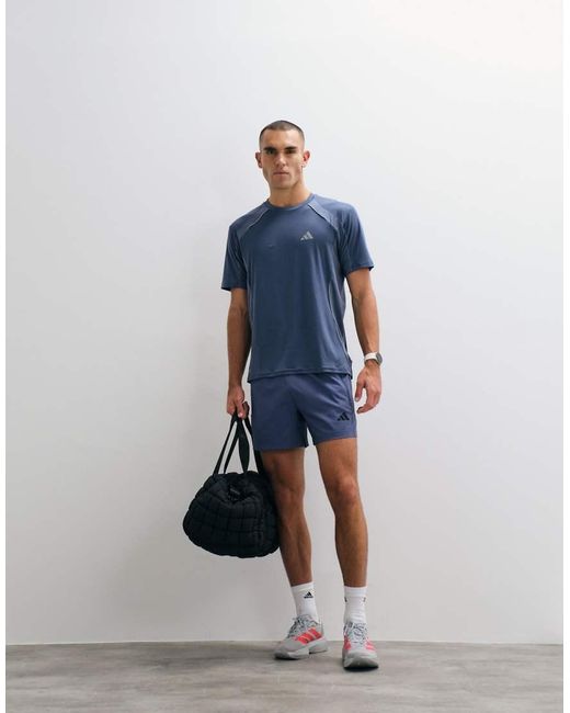 Adidas Originals Blue Adidas Training Essentials Woven Shorts for men