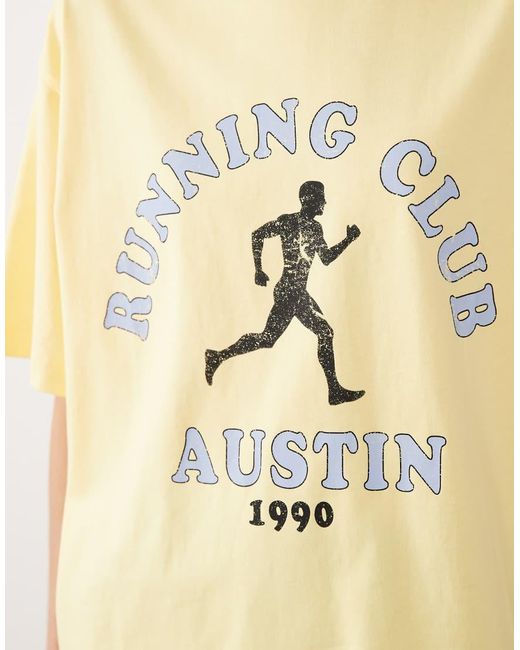 ASOS Yellow Short Sleeve Oversized T-shirt With Running Club Graphic