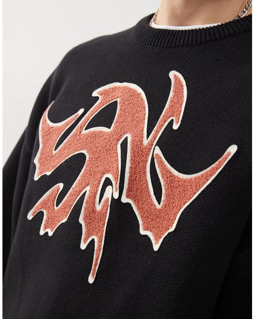 Weekday Black Cypher Oversized Jumper With Red Jacquard Graphic for men