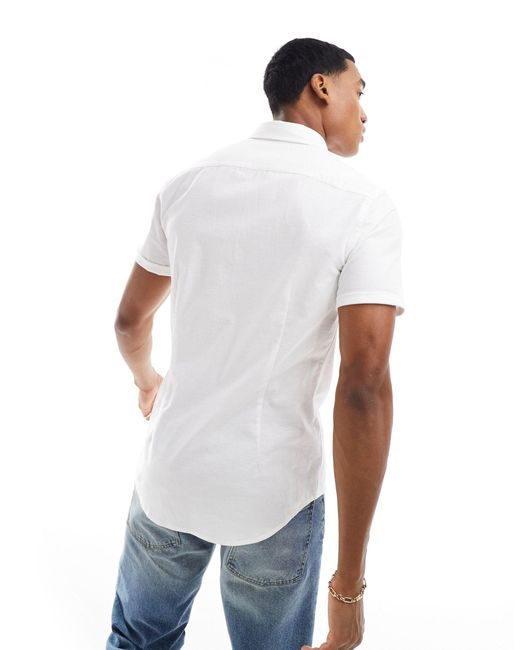 Camicia oxford slim a maniche corte bianca di ASOS in White da Uomo