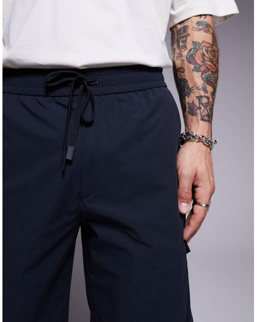 Urbanex - short cargo technique Boss pour homme en coloris Blue