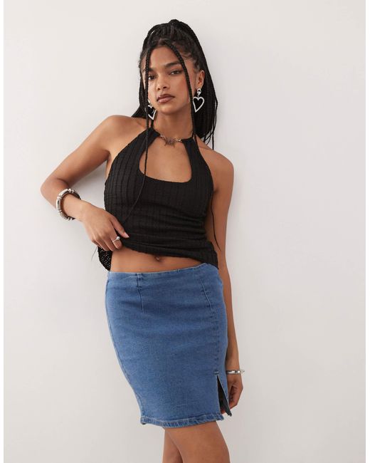 Mini-jupe fendue en jean - moyen Noisy May en coloris Blue