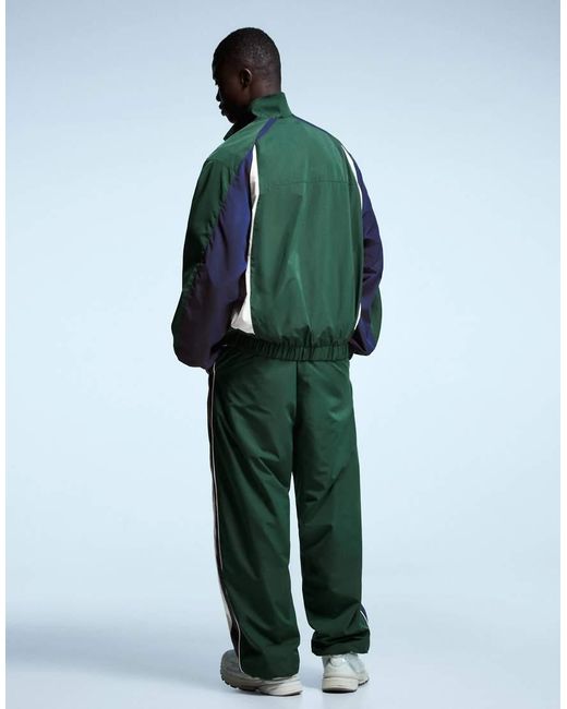 Bershka Green Super Baggy Technical Sports Trousers for men