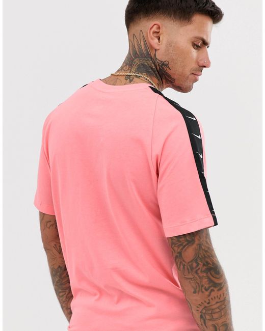 Camiseta rosa con cinta del logo Nike hombre de Rosa Lyst