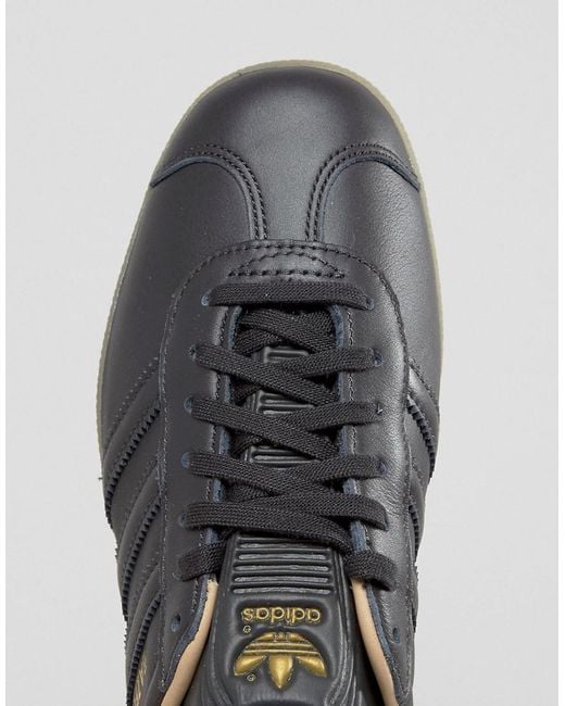 adidas gazelle silver green womens adidas Originals Gazelle x Manchester United - Utility Black/Preloved  Yellow/Gum 4 main image 1