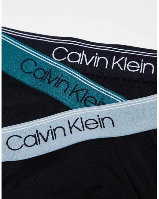 Confezione da 3 boxer aderenti a vita bassa elasticizzati neri con fascia colorata di Calvin Klein in Black da Uomo