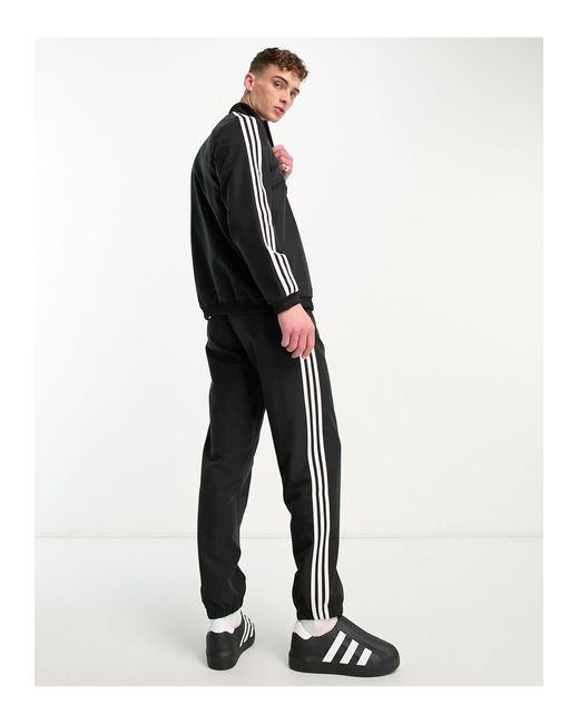 Adidas Originals White Adidas Sportswear Essential Woven Tracksuit for men