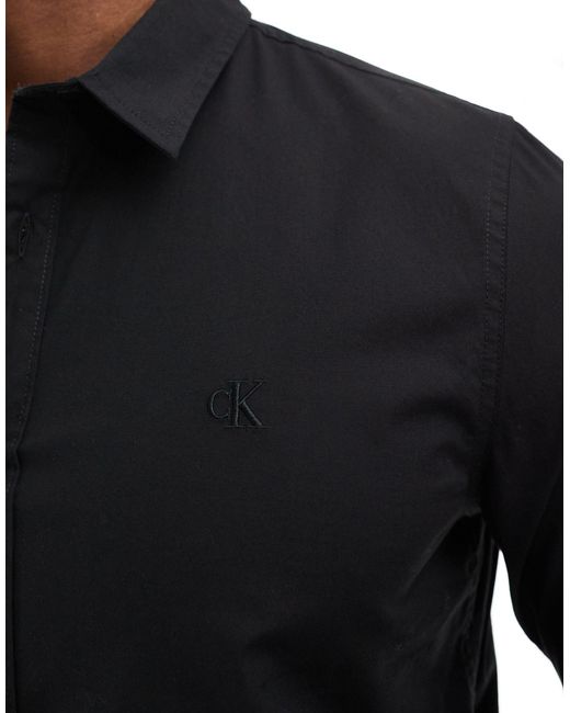 Calvin klein - camicia di jeans slim elasticizzata nera di Calvin Klein in Black da Uomo
