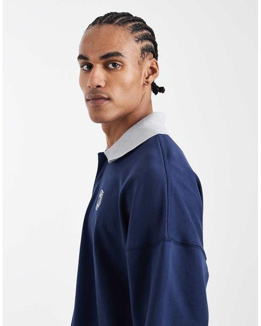 Cotton On Blue Cropped Fit Graphic Fleece Polo Shirt for men