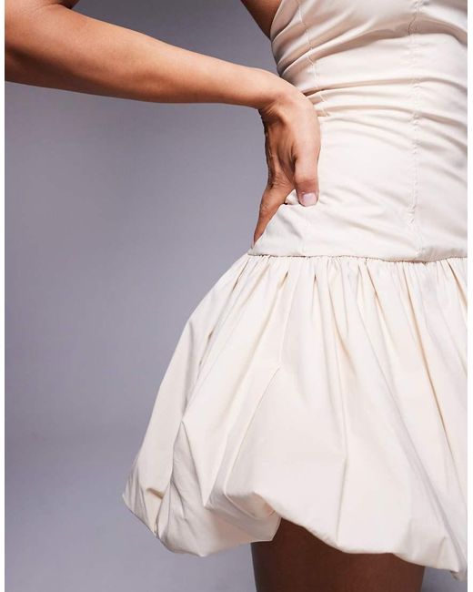 Wanderdoll Natural Sunday Poplin Halterneck Asymmetric Bubble Hem Mini Dress