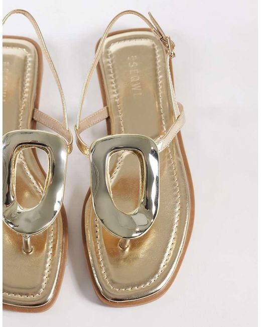 SEQWL White Flat Sandals With Silver Embellishment