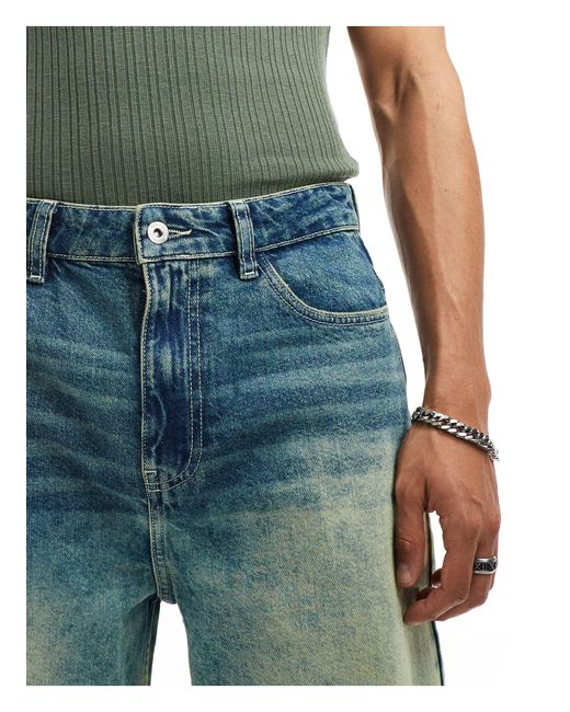 X013 - jeans con fondo ampio a vita medio alta lavaggio di Collusion in Green da Uomo