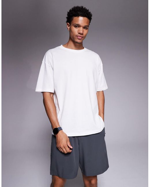 4505 – icon – schnell trocknendes oversize-trainings-t-shirt in White für Herren