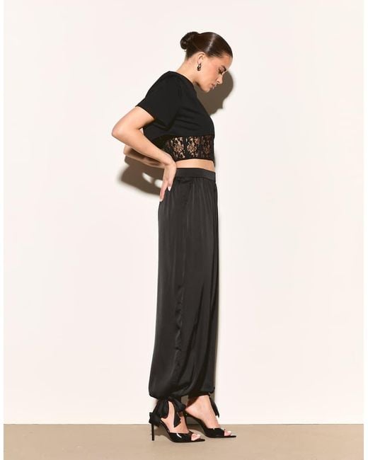 Noughts & Kisses Black Cotton Rich Padded Shoulder Lace Corset Waist Detail Top