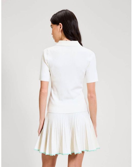 Ellesse White The Umpire Polo