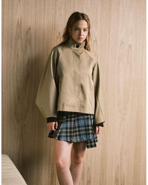 Monki Natural Pleated Mini Skirt With Asymmetric Hem