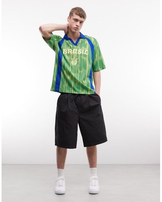 ASOS Green Boxy Oversized Polo With All Over Print And Brazil Football Graphic for men