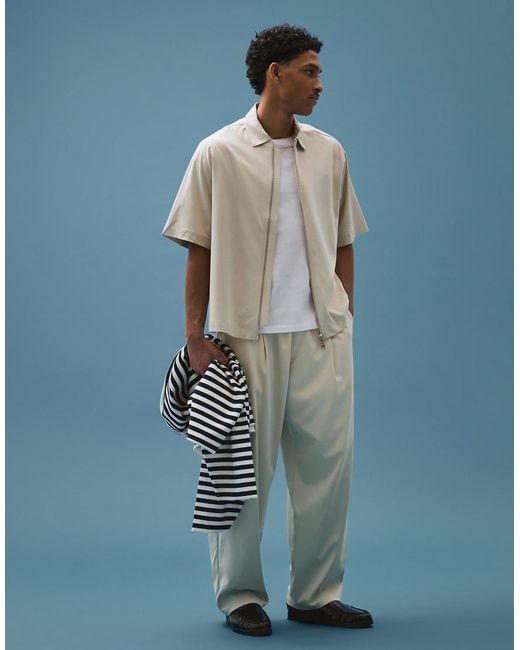 Bershka Blue Fluid Super baggy Darted Trousers for men