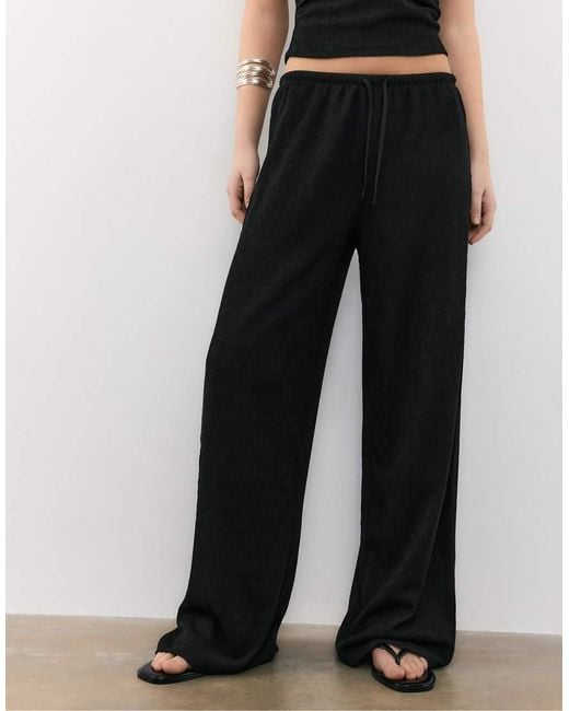 Stradivarius Black Flowing Creased-effect Trousers