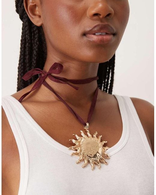 ASOS Natural Necklace On Burgundy Ribbon Cord With Large Sun Pendant