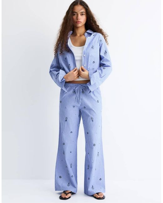 Stradivarius Blue Cropped Shirt With Rhinestones