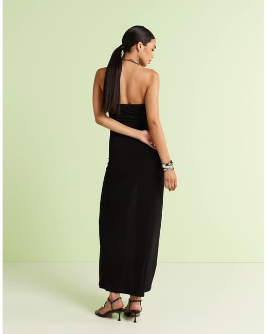 Bandue - robe longue fendue sur le côté avec détails fleurs à la taille Mango en coloris Black
