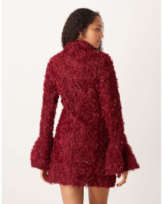 Amy Lynn Red Textu Bell Sleeve High Neck Mini Dress