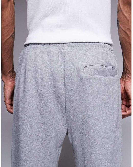 ASOS Natural Tapered joggers With Ribbed Cuffs for men