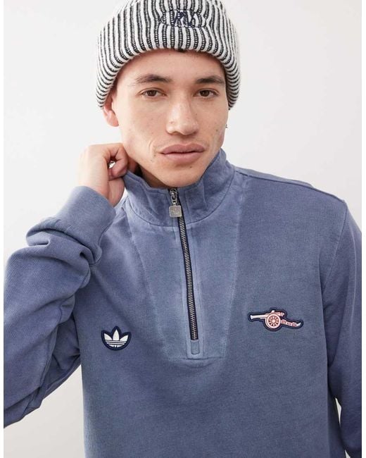 アーセナル☆アディダス☆Arsenal Terrace Icons Half-Zip Top adidas Originals Arsenal Terrace Icons Half-Zip Top in Blue