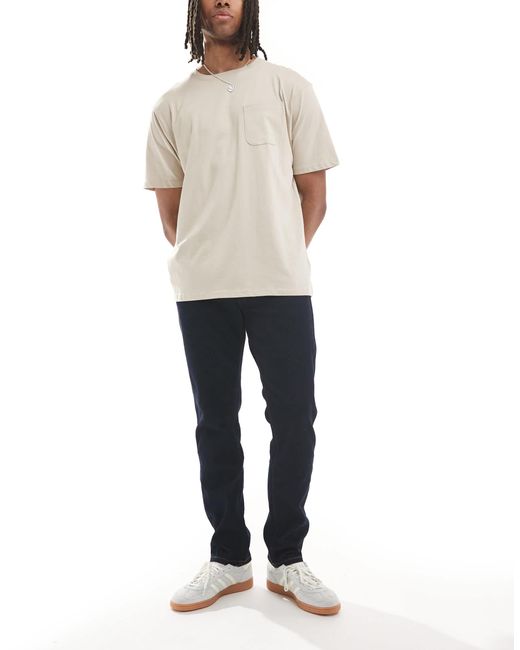 Wrangler – larston – schmale karottenjeans in White für Herren