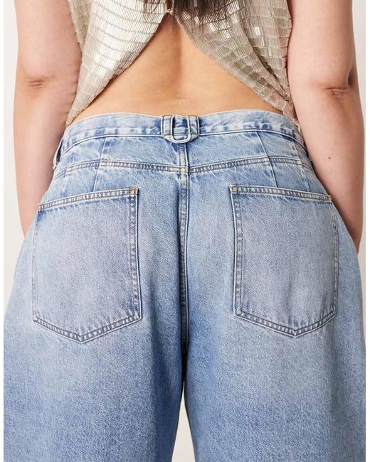 ARRANGE Blue Curve Tova Tapered Curved Leg Jean With Roll Hem