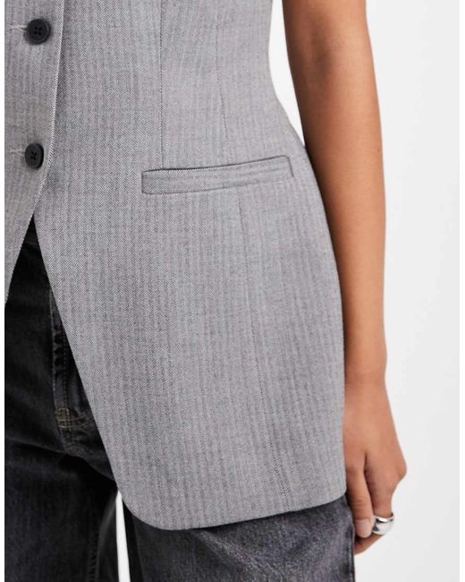 Gilet Sartoriale Accollato Sagomato Sui Fianchi Monocromatico Con Motivo A Spina Di Pesce di ASOS in White