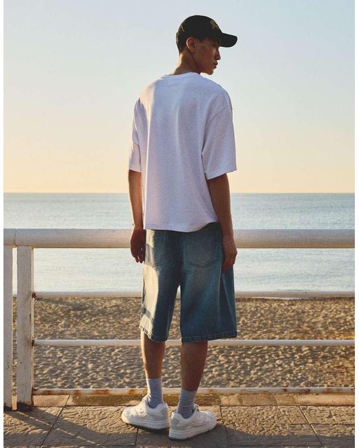 Bershka Blue Embroidered Denim Bermuda Shorts for men