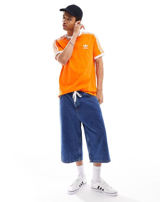 Adidas Originals – t-shirt mit drei streifen in Orange für Herren