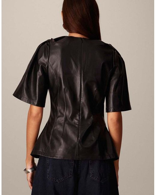 ARRANGE Black Leather Twist Shoulder Top