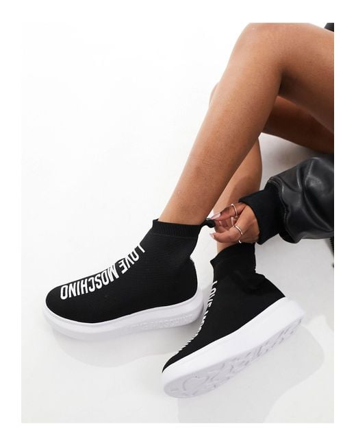 Love Moschino High Top Trainers in Black | Lyst UK