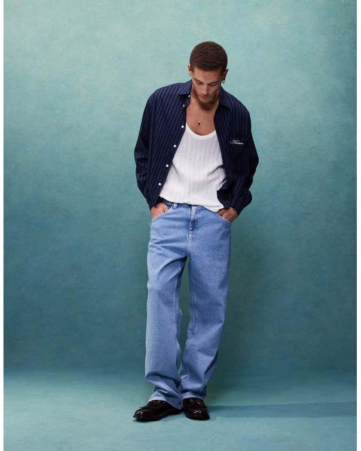 Vaqueros Holgados Con Lavado Claro Aiden De -Azul Tommy Hilfiger de hombre de color Blue
