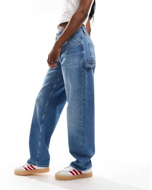 Jeans dritti anni '90 lavaggio chiaro di Calvin Klein in Blue