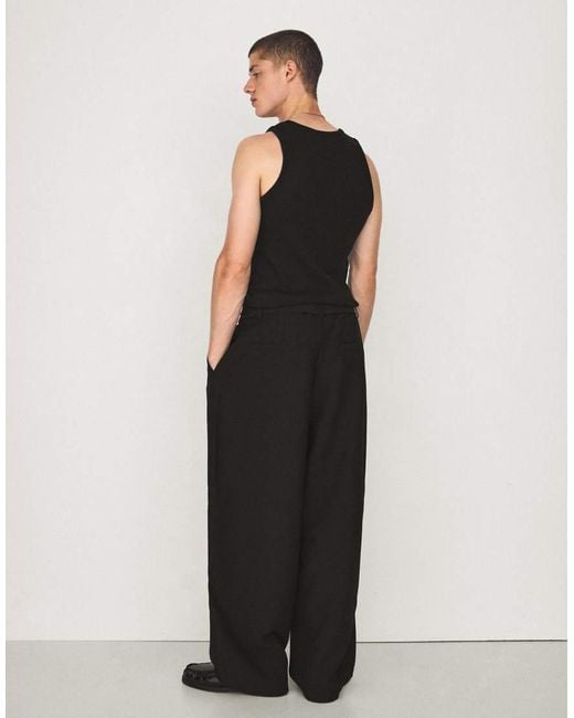 Bershka Black Barrel-Leg Trousers With Darts And Belt for men
