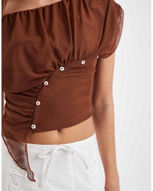 Gemini di laagam in Brown