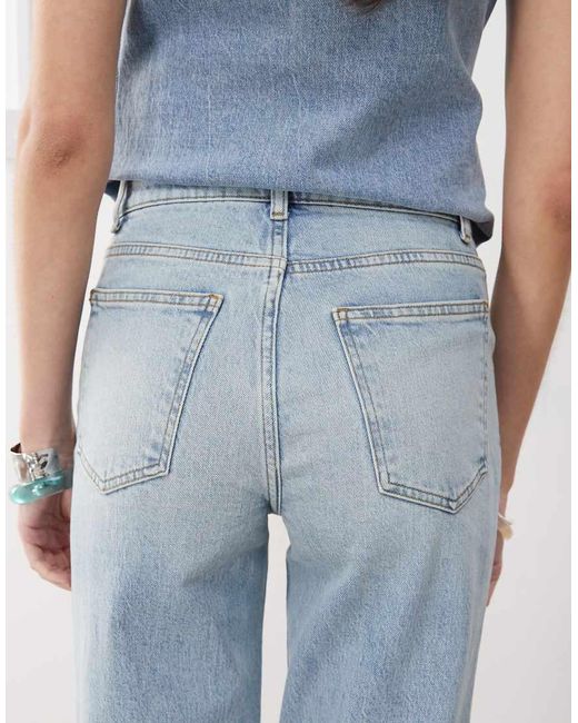 Reclaimed Vintage Blue Denim 70s Palazzo Jeans With Patch Pockets And Button Fly Detail