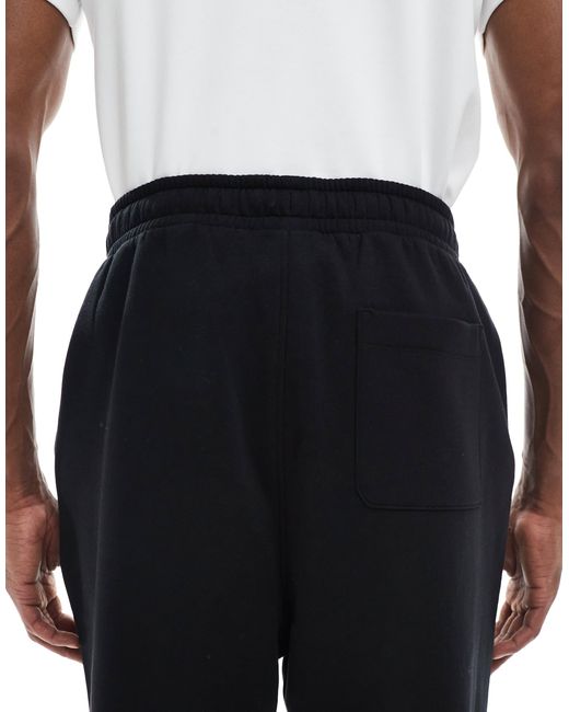 ASOS – essentials – oversize-jogginghose in Blue für Herren