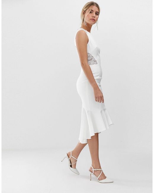 white lace dip hem dress