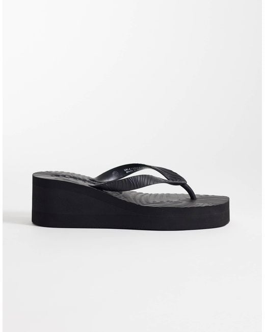 Sleeper Black High Platform Flip Flops