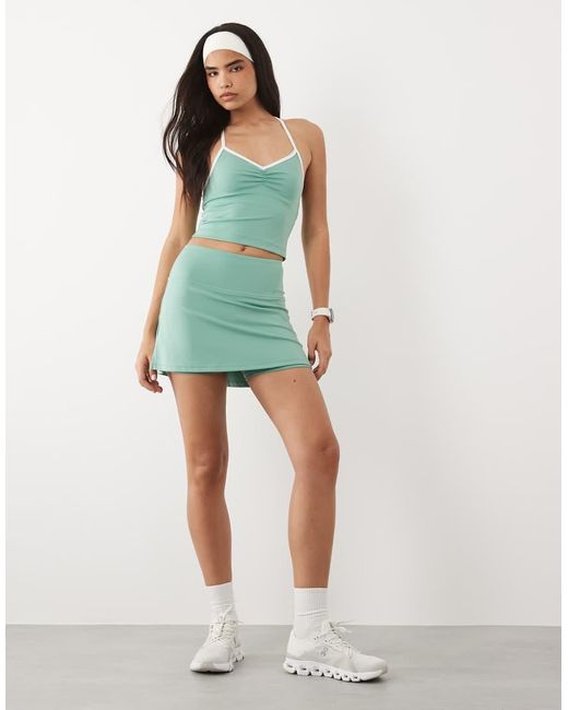 4505 Green Active Ruched Front Singlet With Inner Bra And Contrast Piping