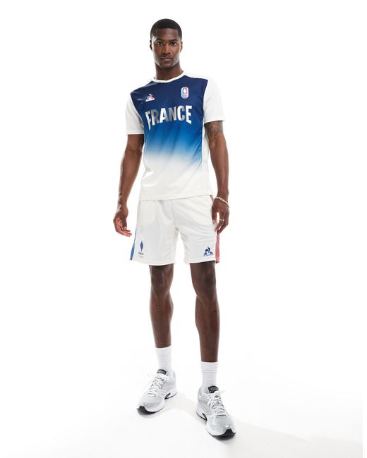 Pantalones cortos blanco con diseño del equipo francés para los juegos Le Coq Sportif de hombre de color Blue