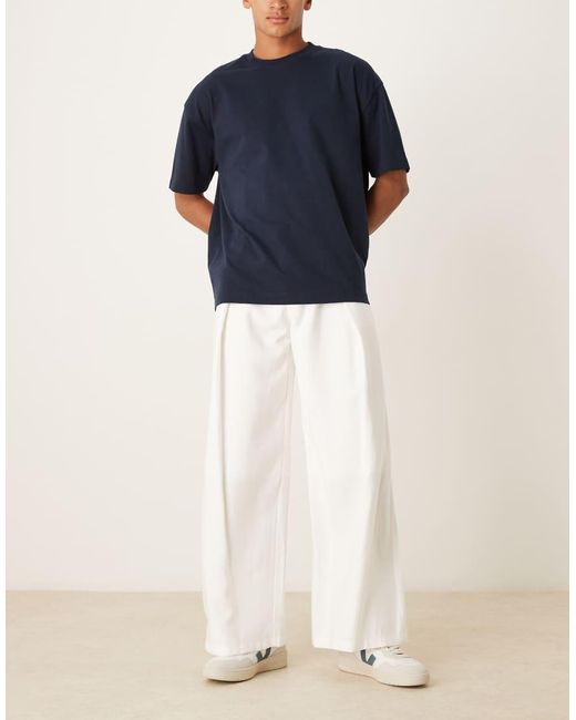Pantalones Blancos De Corte Suelto Con Detalle De Pliegues Pronunciados De ASOS de hombre de color Blue